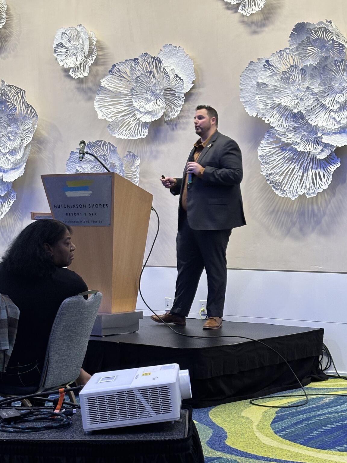 Sharing a workforce perspective from the stage.